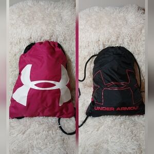 Under Armour Pink And Black REVERSABLE drawstring backpack.